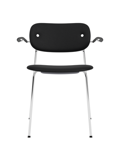 Co Dining Chair with armrests, featuring black Sierra leather upholstery and a sleek chrome frame on a white background.