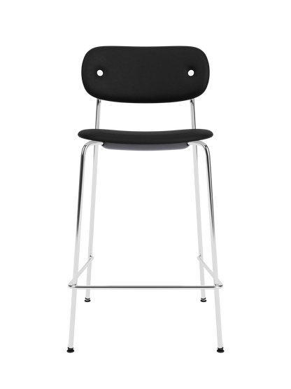 Co Counter Chair, Fully Upholstered in black leather with a chrome frame against a black background.