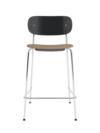 Co Counter Chair with a chrome frame, black painted oak back, and Sierra 1611 upholstered seat shown on a black background.