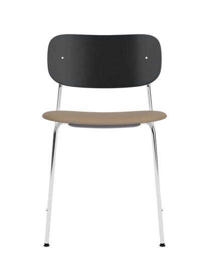 Co Dining Chair with black oak backrest, tan upholstered seat and slim chrome frame on a white background.