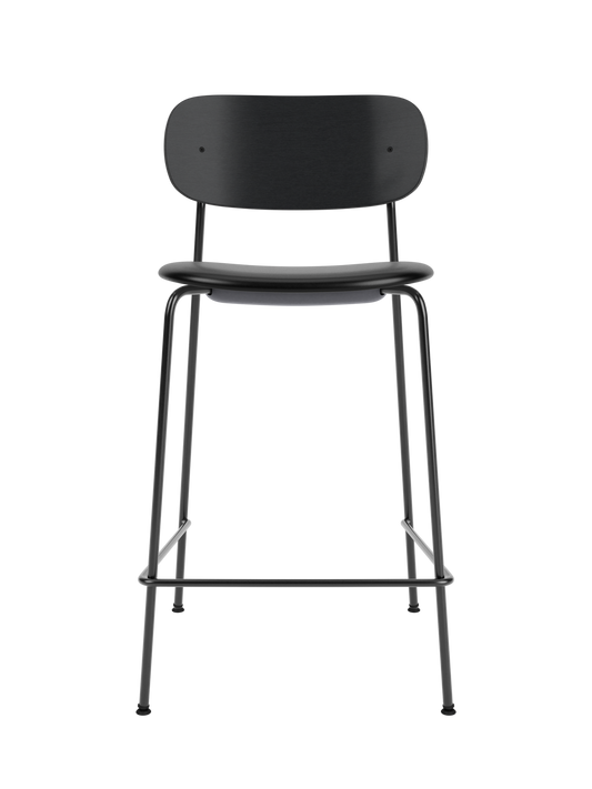 Black Co Counter Chair with an upholstered seat, black painted oak backrest and slender steel frame.
