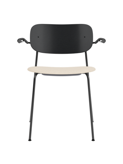 Co Dining Chair with armrests, featuring a black oak backrest and beige Logan Jasmine upholstered seat on a black frame.