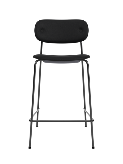 Black Co Counter Chair, Fully Upholstered with black steel frame shown from the front against a black background.