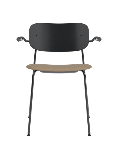 Co Dining Chair with armrests, featuring a black oak backrest and tan Sierra 1611 leather upholstered seat.