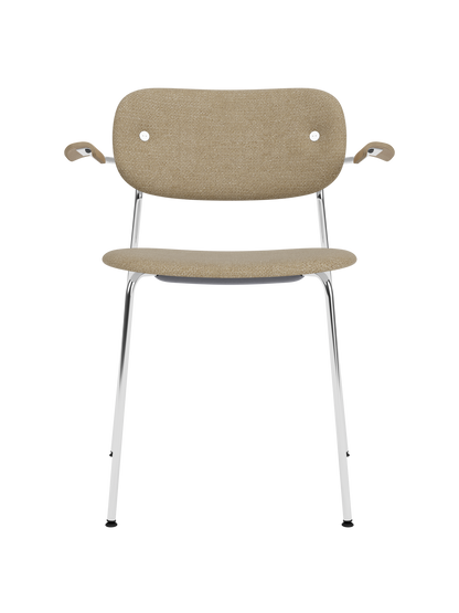 Fully upholstered Co Dining Chair with armrests, chrome frame, Natural Oak details and beige bouclé fabric.