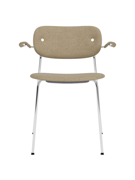 Fully upholstered Co Dining Chair with armrests, chrome frame, Natural Oak details and beige bouclé fabric.