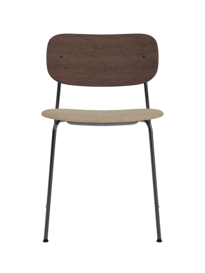 Co Dining Chair featuring a black steel frame, dark stained oak backrest and beige Bouclé 02 upholstered seat.