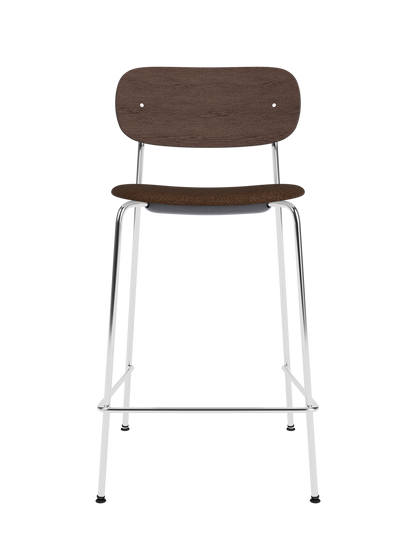 Co Counter Chair in dark stained oak with a black bouclé upholstered seat and chrome steel frame.