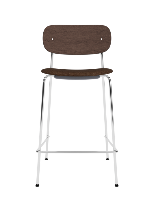Co Counter Chair in dark stained oak with a black bouclé upholstered seat and chrome steel frame.