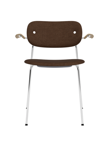 Fully upholstered Co Dining Chair in brown Audo Bouclé with natural oak armrests and a slim chrome frame.