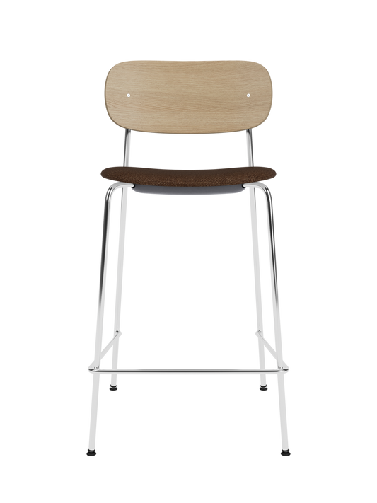 Co Counter Chair with a natural oak wood back, brown bouclé upholstered seat, and a chrome steel frame.