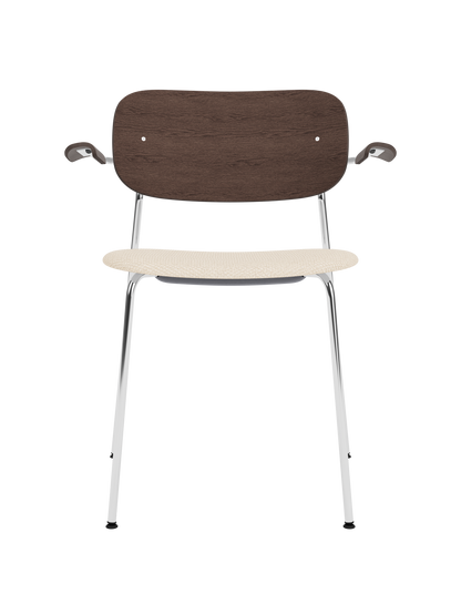 Co Dining Chair with chrome frame, dark stained oak backrest and light Logan Jasmine upholstered seat.