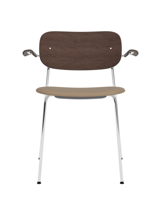 Co Dining Chair with chrome frame, dark stained oak back and tan Sierra leather upholstered seat with armrests.
