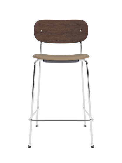 Co Counter Chair in dark stained oak and chrome with an upholstered seat, shown against a black background.