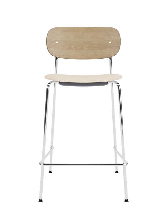Co Counter Chair with a chrome steel frame, natural oak wood back, and Logan Jasmine upholstered seat.