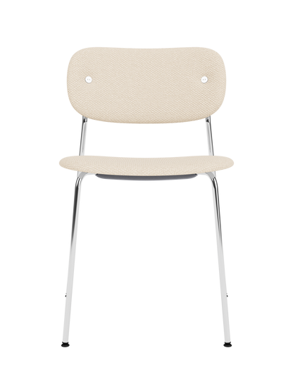 Fully upholstered Co Dining Chair in Logan Jasmine fabric with a minimalist chrome frame and curved backrest.
