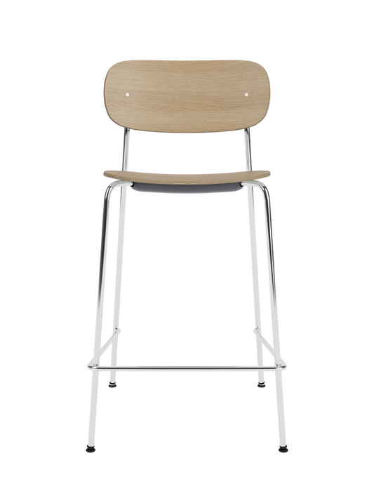 Co Counter Chair in natural oak veneer with a chrome steel frame shown against a solid black background.