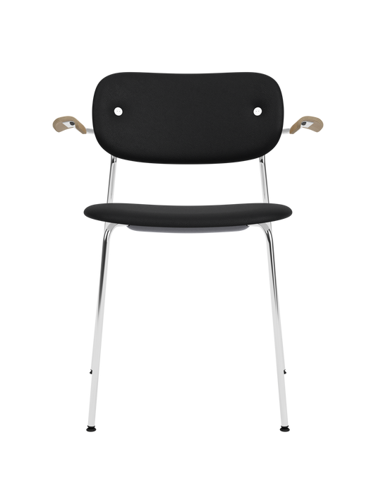 Fully upholstered Co Dining Chair with black Sierra 1001 leather, natural oak armrests and chrome legs.