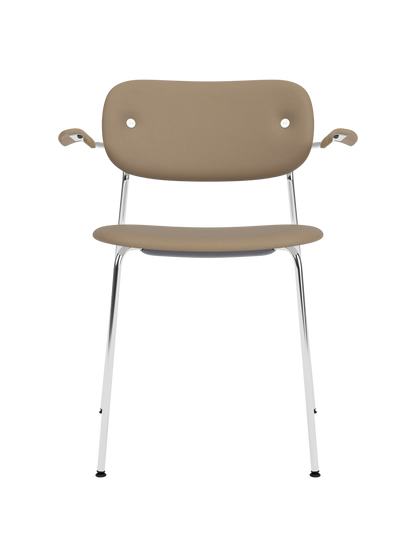 Co Dining Chair with tan Sierra leather upholstery, natural oak armrests and a polished chrome frame.