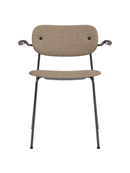 Logan Flint upholstered Co Dining Chair with dark stained oak armrests and a sleek black powder-coated steel frame.