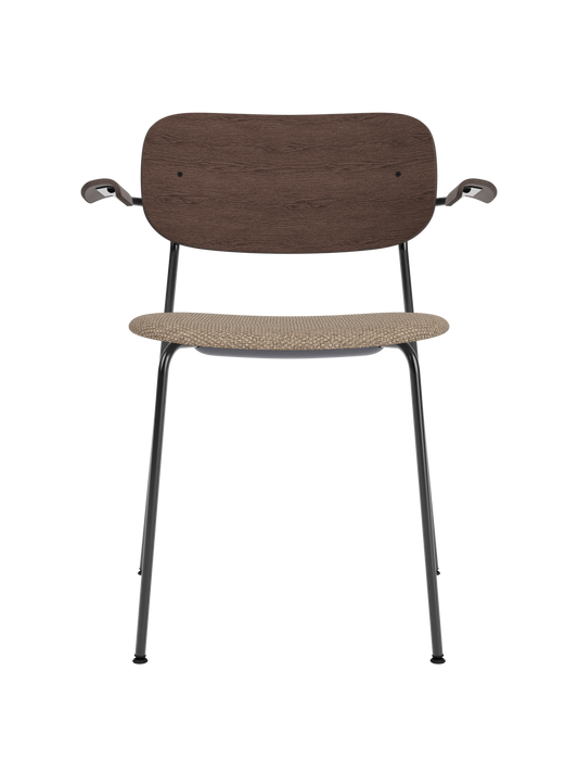 Co Dining Chair with armrests, featuring a dark stained oak backrest and Logan Flint upholstered seat on a black frame.