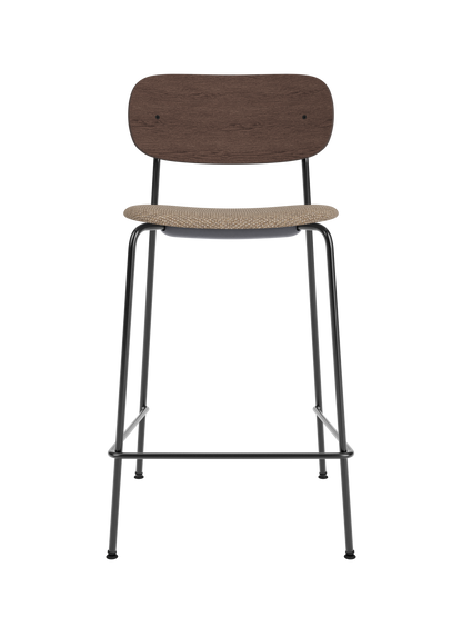 Dark stained oak Co Counter Chair with a Logan Flint upholstered seat and a slender black powder-coated steel frame.