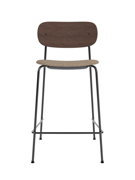 Dark stained oak Co Counter Chair with a Logan Flint upholstered seat and a slender black powder-coated steel frame.