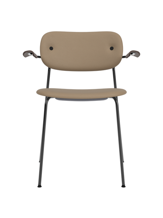 Co Dining Chair, fully upholstered in tan Sierra leather with dark stained oak armrests and black steel frame.