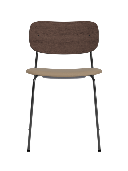 Co Dining Chair featuring a black frame, dark stained oak backrest and tan Sierra 1611 leather upholstered seat.