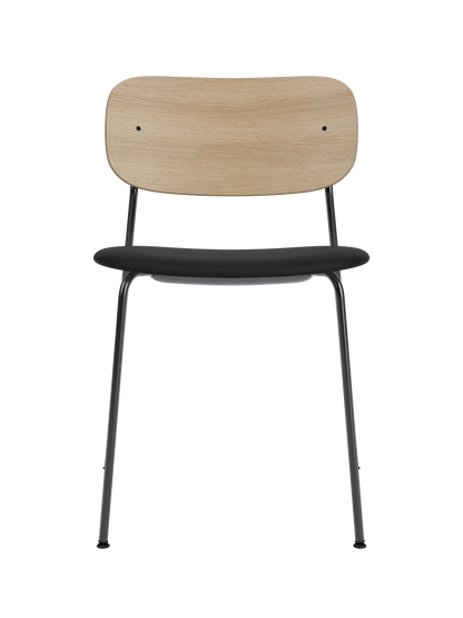 Co Dining Chair featuring a natural oak backrest, black upholstered seat and a slim black steel frame.