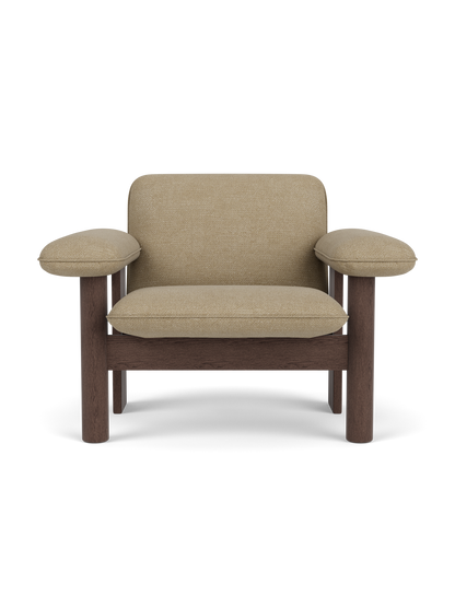 Front view of the Brasilia Lounge Chair, Low Back, featuring a dark stained oak frame and light beige Audo Bouclé upholstery.