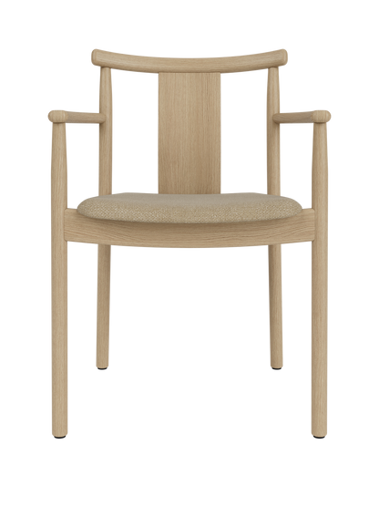 Merkur Dining Chair with Armrests in natural oak with a textured beige bouclé seat, isolated on white.