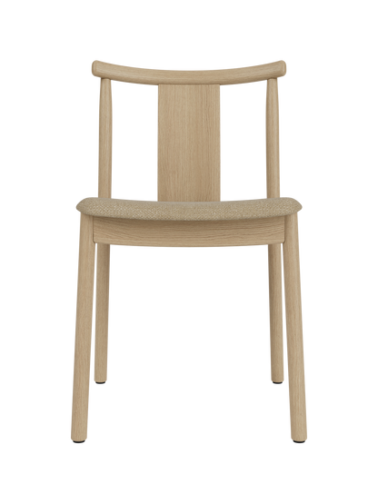 Merkur Dining Chair in natural oak with a beige bouclé seat, featuring a modern solid wood frame and curved backrest.