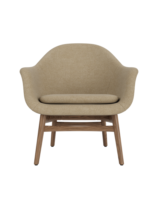 Harbour Lounge Chair in beige Audo Bouclé 02 upholstery with a solid walnut wood frame and sculptural, curved shell.