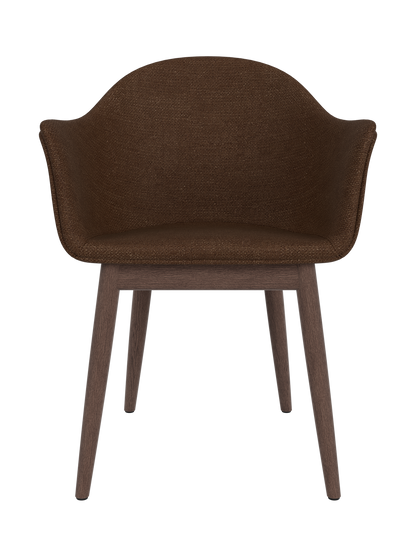 Harbour Dining Chair with a curved shell in dark brown Audo Bouclé 07 fabric and a dark stained oak wooden base.