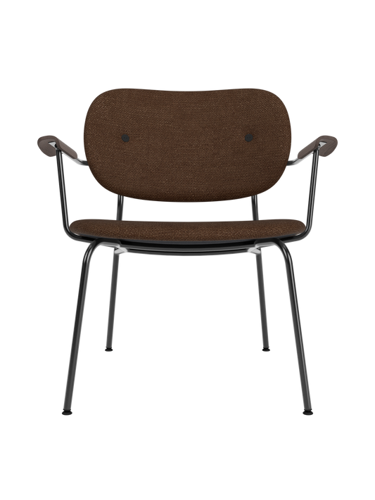 Co Lounge Chair, fully upholstered in brown bouclé fabric with dark stained oak armrests and slender black steel legs.