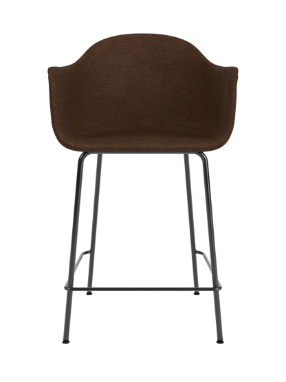 Brown Audo Bouclé 07 upholstered Harbour Counter Chair with a slim black powder-coated steel base and footrest.