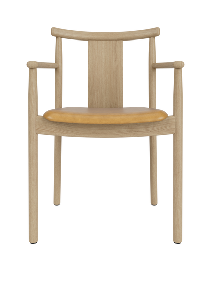 Merkur Dining Chair w/Armrests in natural oak with a tan leather seat, captured against a white background.