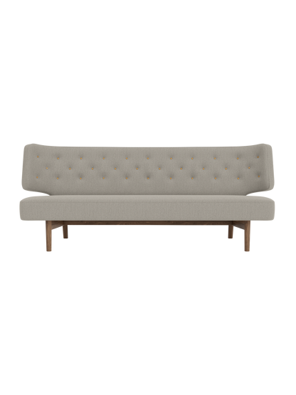 Radiohus Sofa P2 featuring grey Re-wool 218 upholstery, walnut legs and quilted back with Dakar leather buttons.