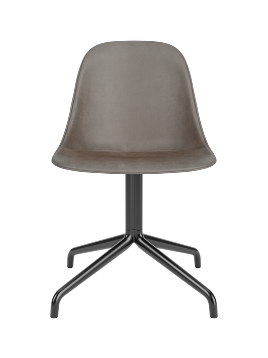 Harbour Side Dining Chair featuring a brown Dakar 0311 leather shell and a black powder-coated aluminium star base.