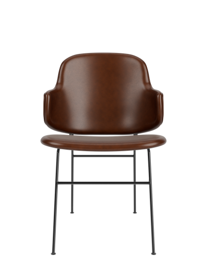 The Penguin Dining Chair, Fully Upholstered, featuring brown Aida 0329 upholstery and slim black steel legs.