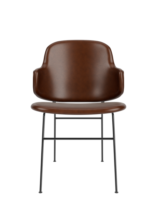 The Penguin Dining Chair, Fully Upholstered, featuring brown Aida 0329 upholstery and slim black steel legs.