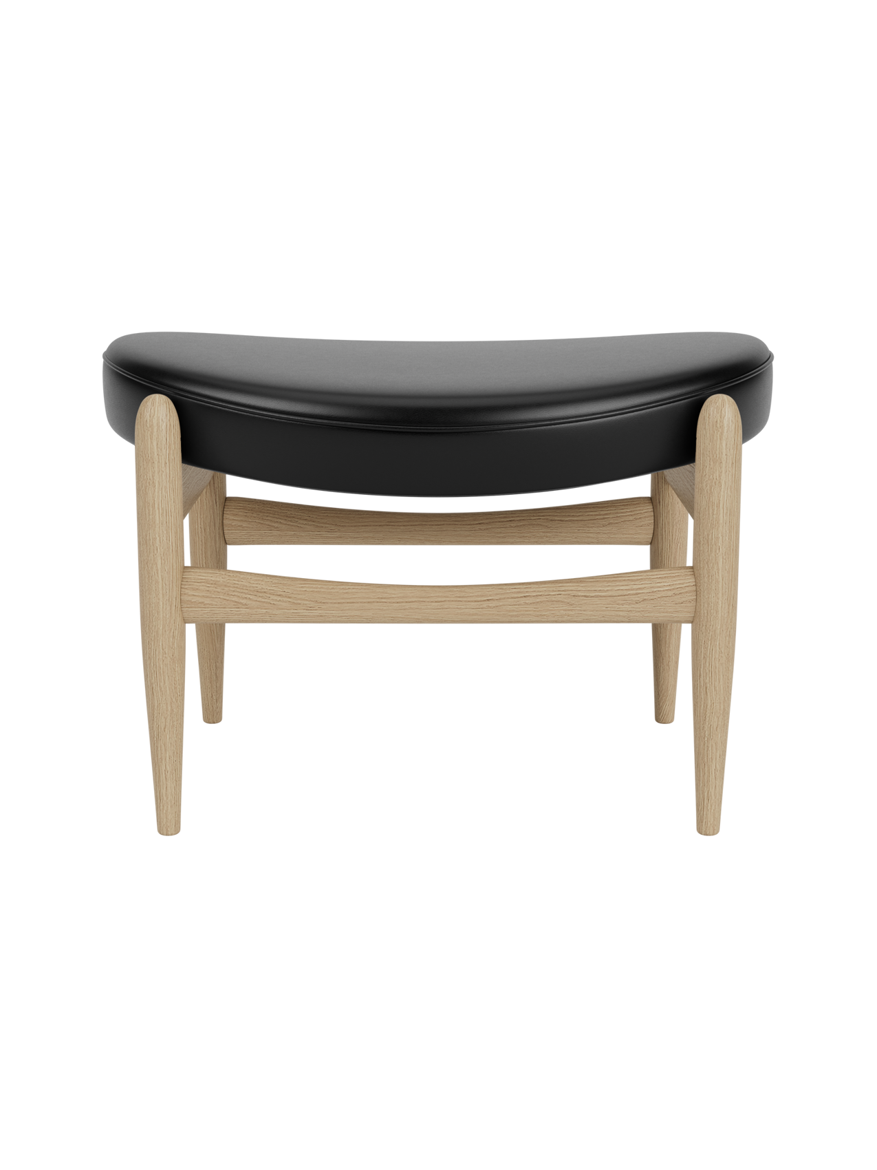 Elizabeth Ottoman featuring a curved black leather seat and a light natural oak frame with tapered legs.