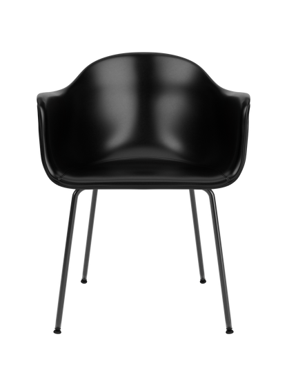 Harbour Dining Chair upholstered in black Dakar 0842 leather, featuring an organic shell and slim black steel legs.