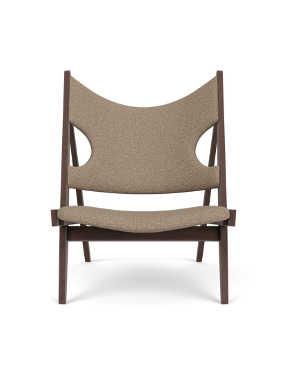 Front view of the Knitting Lounge Chair in dark stained oak with Logan Flint upholstery, on a black background.
