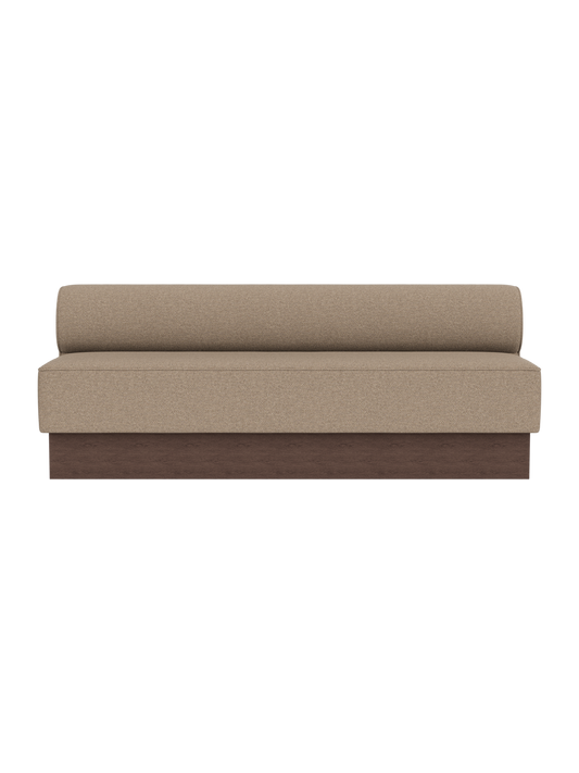 Eave Dining Sofa, Plateau in Logan Flint upholstery with a dark stained oak base, viewed from the front.