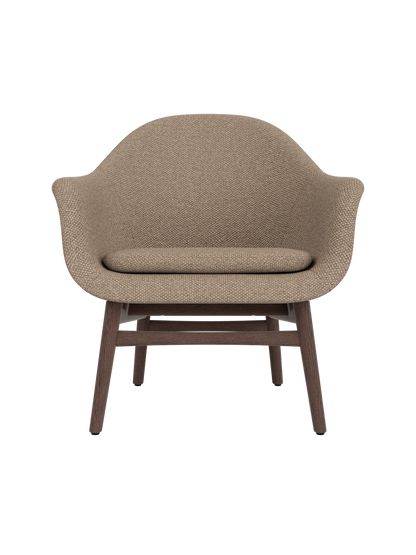 Harbour Lounge Chair upholstered in Logan Flint with a dark stained oak frame and sculptural curved armrests.