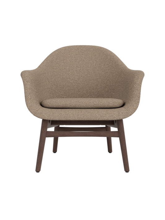 Harbour Lounge Chair upholstered in Logan Flint with a dark stained oak frame and sculptural curved armrests.