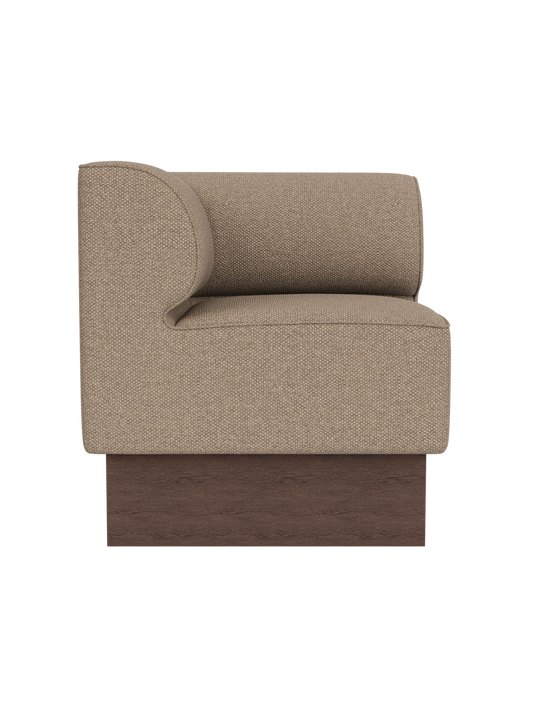 Eave Dining Sofa, Plateau in dark stained oak with Logan Flint upholstery, shown from a side profile view.