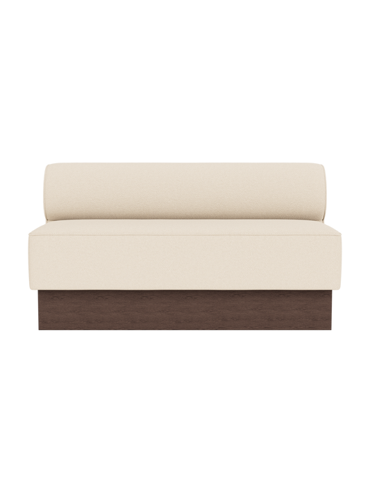 Eave Dining Sofa, Plateau in Logan Jasmine upholstery featuring a dark stained oak base, viewed from the front.